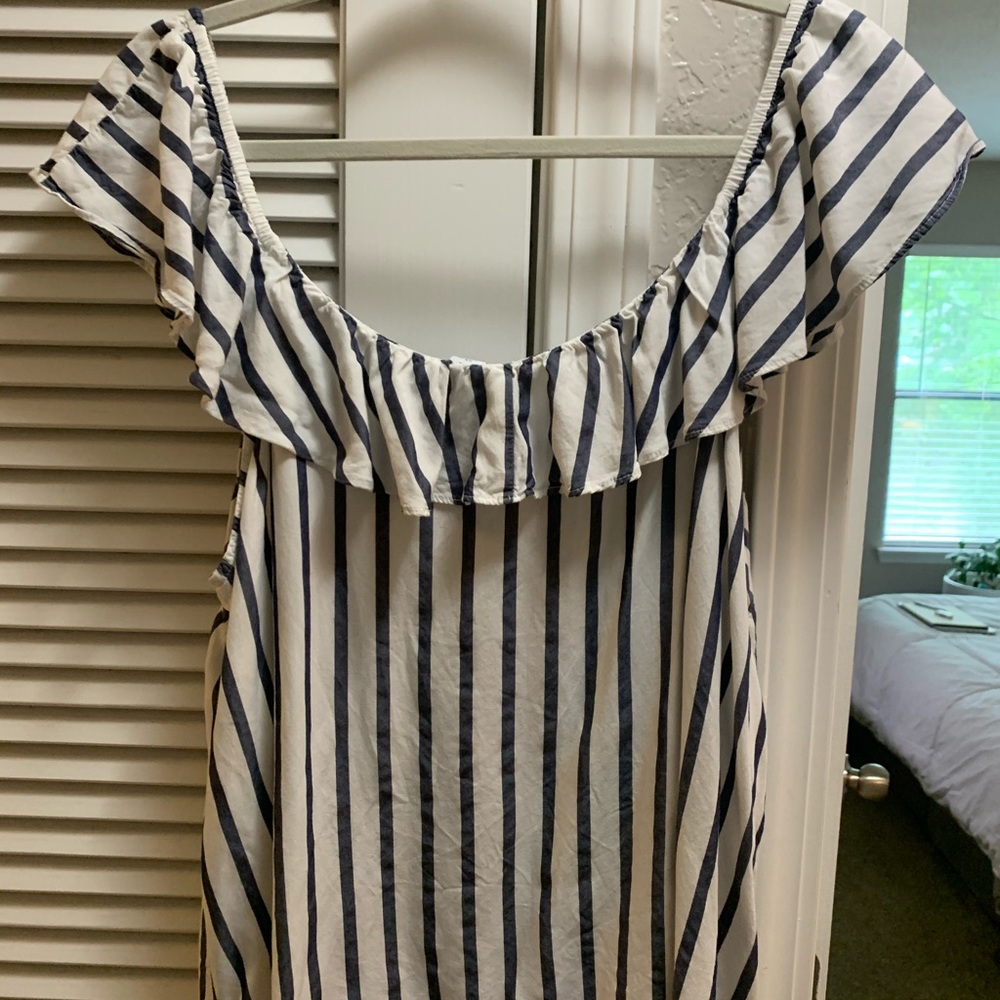 Ruffle off the shoulder top.